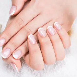 Pf 5f296f49 womannailsalonreceivingmanicurebybeauticianbeautytreatmentconcept.jpg